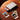 Xiaomi Impresora Portatil Foto Portable Xiaomi Photo Printer 1S Xiaomi Portable Photo Printer 1S imprimiendo una fotografía de un atardecer sobre una mesa de madera con fotos de flores y comida alrededor.
