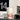 Vaso térmico Mega Tumbler Clásico Germ x Coca-Cola 1100ml / 37.2 Oz Vaso térmico blanco Coca-Cola con tapa y pajita, sobre un escritorio con un monitor y un teclado.