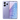 Teléfono móvil Redmi Note 14S color lavanda, vista trasera con módulo de cámara triple circular y logo Redmi 5G. Pantalla frontal encendida con diseño abstracto.